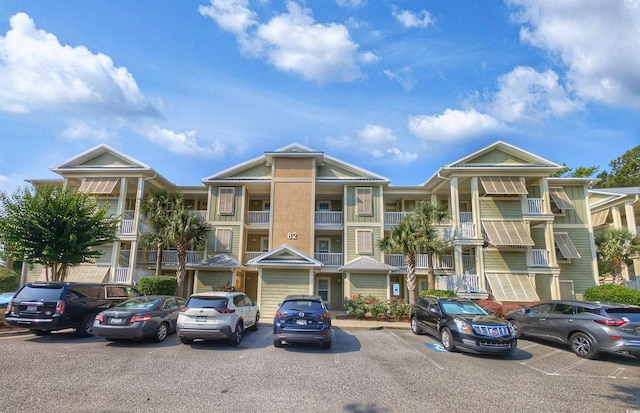 82 Mingo Dr Unit 2D, Pawleys Island, SC 29585 - view of building exterior with uncovered parking