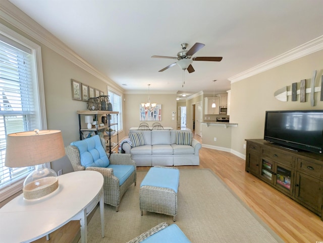 82 Mingo Dr Unit 2D, Pawleys Island, SC 29585 - living room with light wood finished floors, a ceiling fan, healthy amount of natural light, and crown molding
