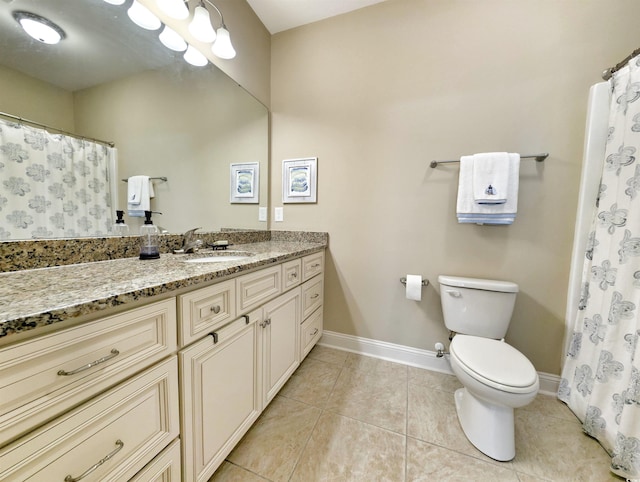 82 Mingo Dr Unit 2D, Pawleys Island, SC 29585 - bathroom featuring vanity, toilet, baseboards, tile patterned flooring, and curtained shower