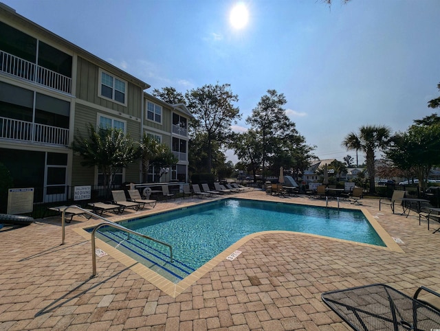 82 Mingo Dr Unit 2D, Pawleys Island, SC 29585 - community pool with a patio