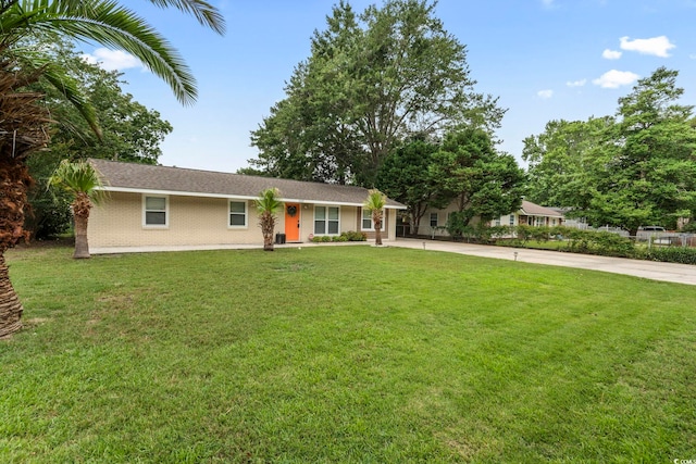 1223 Naylor Ave, Myrtle Beach, SC 29577 - single story home featuring driveway, a front yard, and brick siding