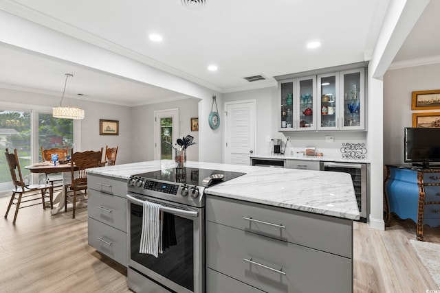 1223 Naylor Ave, Myrtle Beach, SC 29577 - kitchen featuring gray cabinetry, stainless steel range with electric cooktop, beverage cooler, light wood-type flooring, and ornamental molding