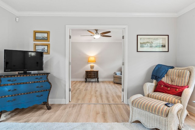 1223 Naylor Ave, Myrtle Beach, SC 29577 - sitting room featuring wood finished floors, ornamental molding, ceiling fan, and baseboards