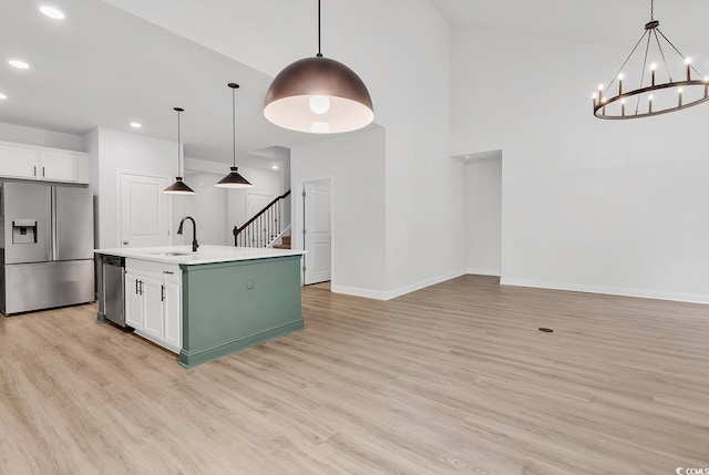 218 Calhoun Falls Dr, Myrtle Beach, SC 29579 - kitchen with stainless steel appliances, a sink, recessed lighting, light wood-style floors, and baseboards