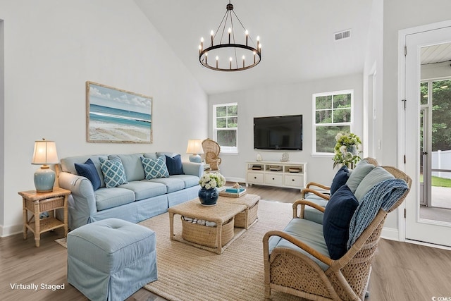 218 Calhoun Falls Dr, Myrtle Beach, SC 29579 - living area with a chandelier, wood finished floors, plenty of natural light, and high vaulted ceiling
