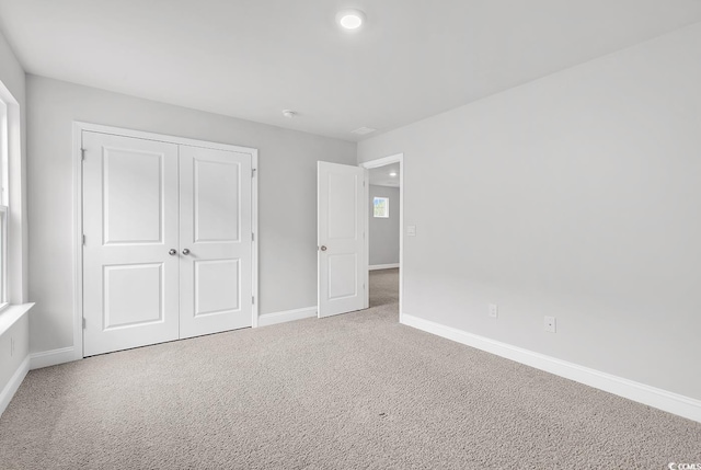 218 Calhoun Falls Dr, Myrtle Beach, SC 29579 - unfurnished bedroom featuring carpet floors, baseboards, and a closet