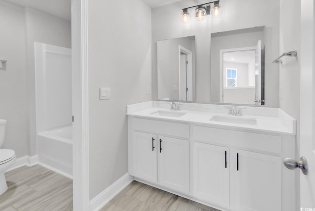 218 Calhoun Falls Dr, Myrtle Beach, SC 29579 - full bathroom with toilet, double vanity, and baseboards