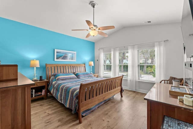 1833 Lake Egret Dr, North Myrtle Beach, SC 29582 - bedroom with lofted ceiling, light wood-style flooring, and ceiling fan
