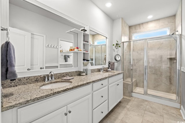 1833 Lake Egret Dr, North Myrtle Beach, SC 29582 - bathroom featuring double vanity, a shower stall, tile patterned floors, and recessed lighting