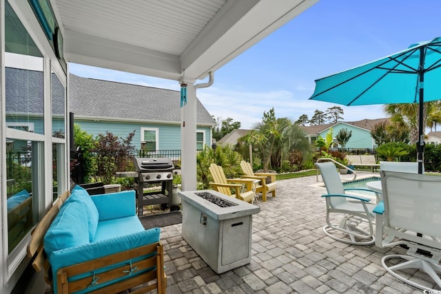 1833 Lake Egret Dr, North Myrtle Beach, SC 29582 - view of patio with an outdoor living space with a fire pit and a grill