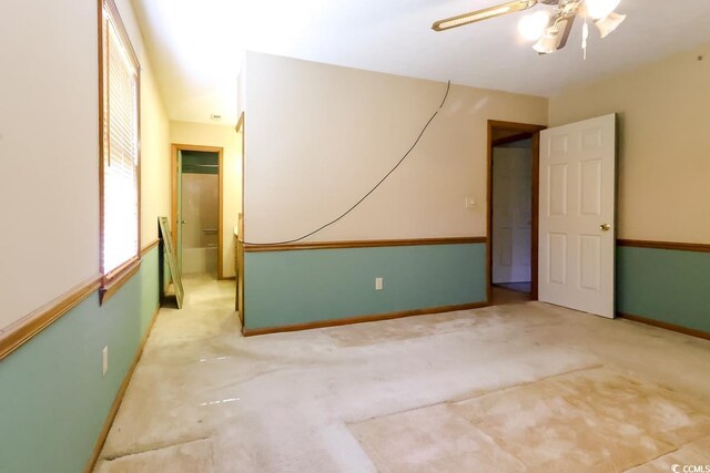 3150 Dusty Rd, Loris, SC 29569 - spare room featuring a ceiling fan and carpet