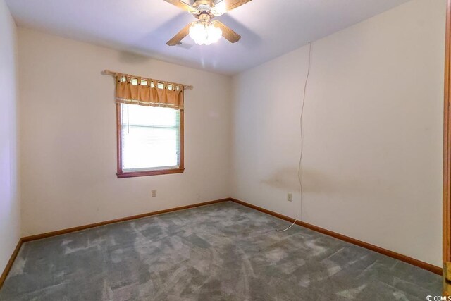 3150 Dusty Rd, Loris, SC 29569 - unfurnished room with carpet floors and a ceiling fan
