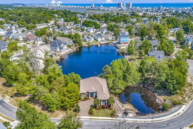 1108 Surf Pointe Dr, North Myrtle Beach, SC 29582 - aerial perspective of suburban area with a large body of water
