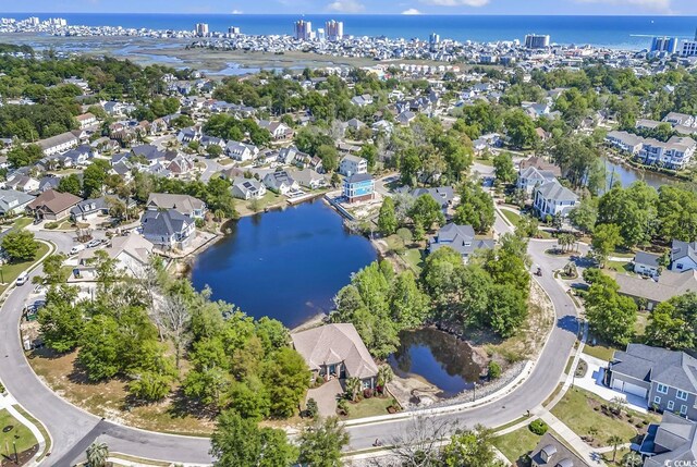 1108 Surf Pointe Dr, North Myrtle Beach, SC 29582 - aerial view of property's location with a large body of water and nearby suburban area