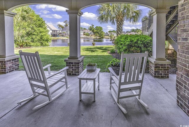 1108 Surf Pointe Dr, North Myrtle Beach, SC 29582 - view of patio / terrace featuring a water view