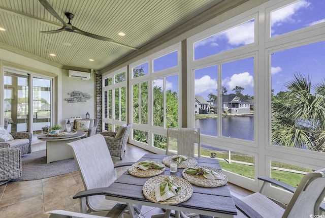 1108 Surf Pointe Dr, North Myrtle Beach, SC 29582 - sunroom with a water view, a wall mounted AC, recessed lighting, and ornamental molding