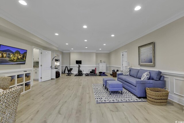 1108 Surf Pointe Dr, North Myrtle Beach, SC 29582 - living room with ornamental molding, a wainscoted wall, light wood-type flooring, recessed lighting, and a decorative wall