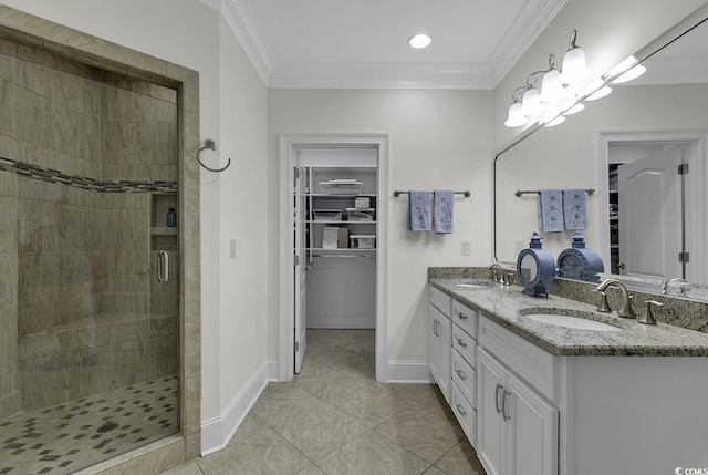 1108 Surf Pointe Dr, North Myrtle Beach, SC 29582 - bathroom featuring double vanity, a walk in closet, a shower stall, crown molding, and baseboards