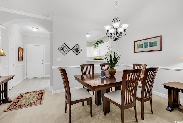 6015 Catalina Dr Unit 733, North Myrtle Beach, SC 29582 - dining room featuring arched walkways, a chandelier, crown molding, light colored carpet, and baseboards