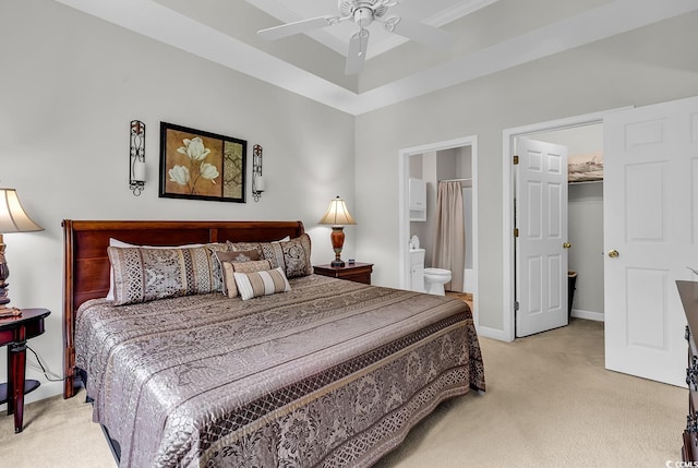 6015 Catalina Dr Unit 733, North Myrtle Beach, SC 29582 - bedroom featuring light colored carpet, a walk in closet, ensuite bathroom, and a ceiling fan