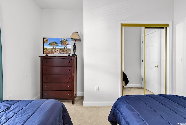 6015 Catalina Dr Unit 733, North Myrtle Beach, SC 29582 - bedroom with light carpet, a closet, and baseboards
