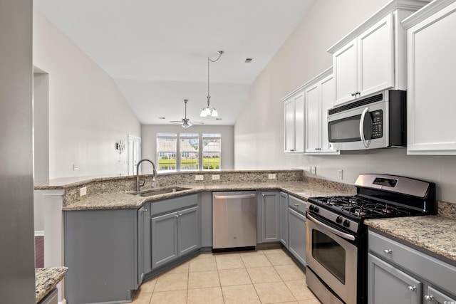 121 Parmelee Dr Unit D, Murrells Inlet, SC 29576 - kitchen with stainless steel appliances, gray cabinetry, a sink, lofted ceiling, and ceiling fan
