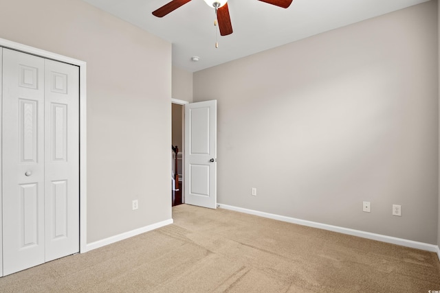121 Parmelee Dr Unit D, Murrells Inlet, SC 29576 - unfurnished bedroom with light colored carpet, a closet, baseboards, and ceiling fan
