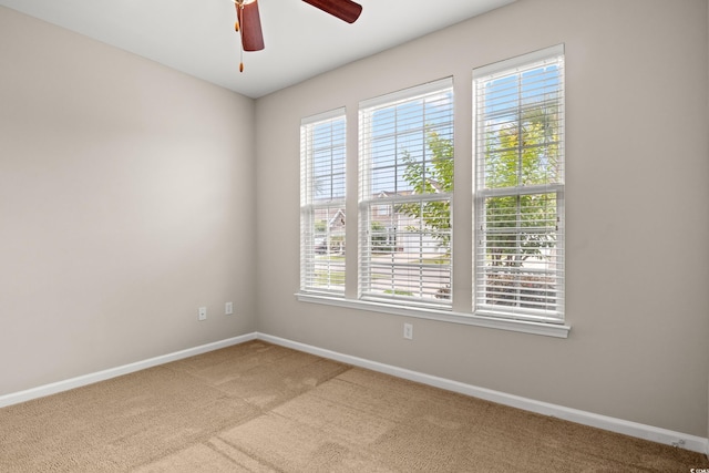 121 Parmelee Dr Unit D, Murrells Inlet, SC 29576 - carpeted spare room with baseboards, healthy amount of natural light, and a ceiling fan