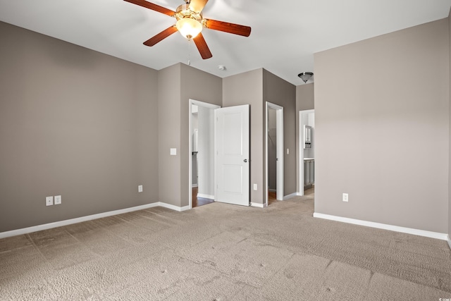 121 Parmelee Dr Unit D, Murrells Inlet, SC 29576 - unfurnished bedroom featuring carpet flooring, baseboards, a spacious closet, and a ceiling fan
