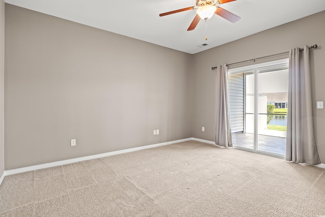 121 Parmelee Dr Unit D, Murrells Inlet, SC 29576 - carpeted empty room featuring ceiling fan, baseboards, and a water view