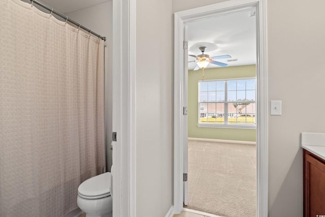 121 Parmelee Dr Unit D, Murrells Inlet, SC 29576 - bathroom with ceiling fan, vanity, toilet, a shower with curtain, and baseboards