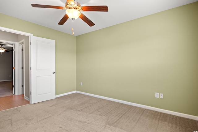 121 Parmelee Dr Unit D, Murrells Inlet, SC 29576 - unfurnished bedroom featuring carpet flooring, baseboards, and ceiling fan