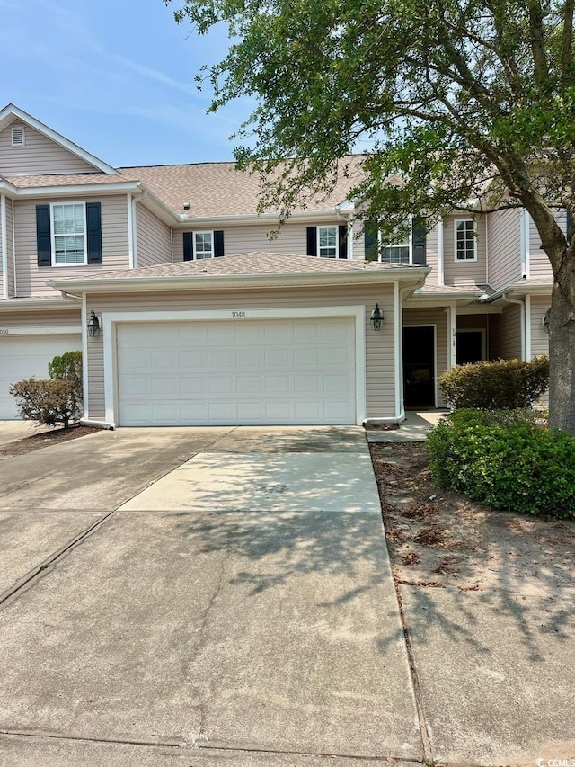 1048 Fairway Ln Unit 1048, Conway, SC 29526 - view of front of home with driveway and a garage