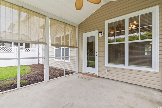 185 Fulbourn Pl, Myrtle Beach, SC 29579 - unfurnished sunroom featuring vaulted ceiling and a ceiling fan