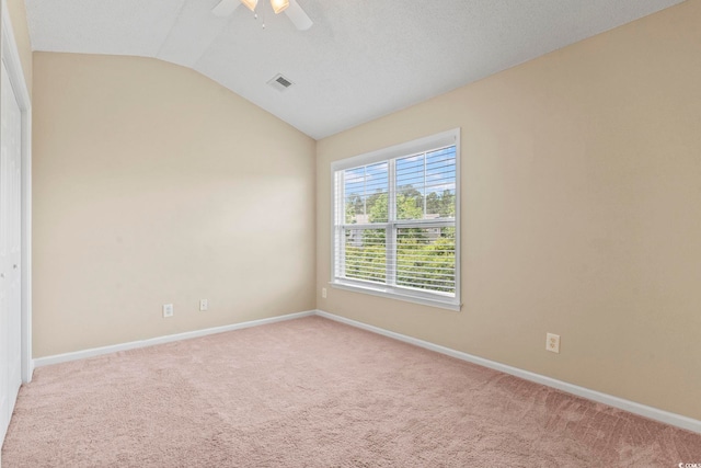 185 Fulbourn Pl, Myrtle Beach, SC 29579 - spare room featuring lofted ceiling, light carpet, and ceiling fan