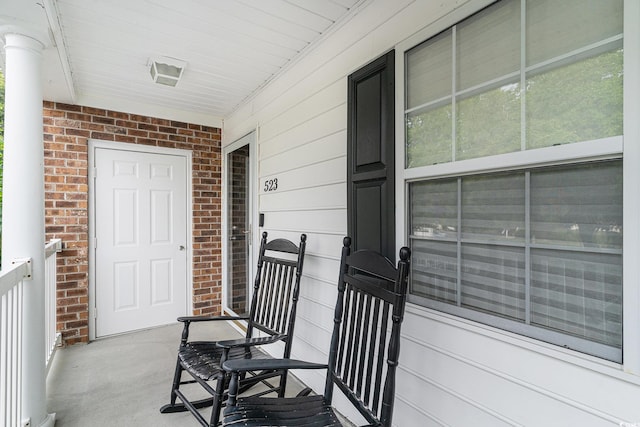 157 Egret Run Ln Unit 523, Pawleys Island, SC 29585 - doorway to property with covered porch and brick siding