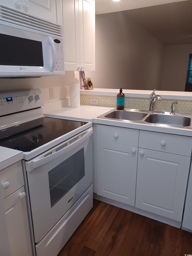 157 Egret Run Ln Unit 523, Pawleys Island, SC 29585 - kitchen with white appliances, light countertops, and white cabinetry