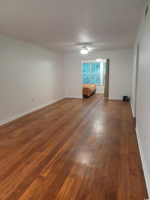 157 Egret Run Ln Unit 523, Pawleys Island, SC 29585 - spare room with dark wood-style floors and baseboards