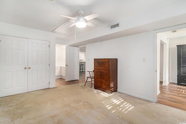 157 Egret Run Ln Unit 523, Pawleys Island, SC 29585 - bedroom featuring attic access, light carpet, a closet, and ceiling fan