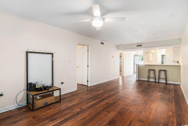 157 Egret Run Ln Unit 523, Pawleys Island, SC 29585 - living area featuring ceiling fan, dark wood-style floors, and a textured ceiling