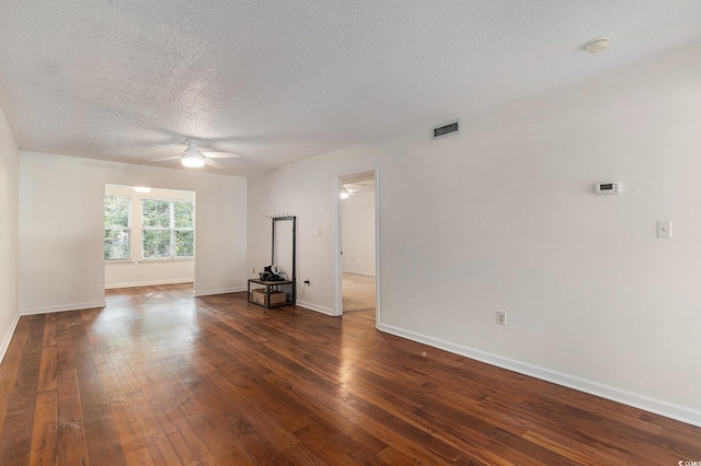 157 Egret Run Ln Unit 523, Pawleys Island, SC 29585 - unfurnished room featuring a ceiling fan, dark wood-style flooring, a textured ceiling, and a smoke detector
