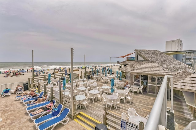 9550 Shore Dr Unit 1418, Myrtle Beach, SC 29572 - wooden deck featuring view of water and beach