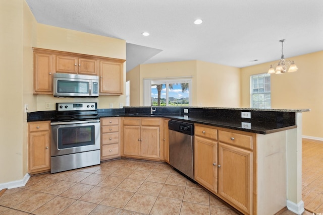 2384 Covington Dr, Myrtle Beach, SC 29579 - kitchen with appliances with stainless steel finishes, healthy amount of natural light, a chandelier, a peninsula, and recessed lighting