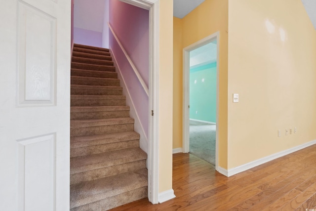 2384 Covington Dr, Myrtle Beach, SC 29579 - stairway featuring wood finished floors and baseboards