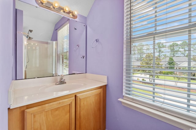 2384 Covington Dr, Myrtle Beach, SC 29579 - bathroom with vanity and vaulted ceiling