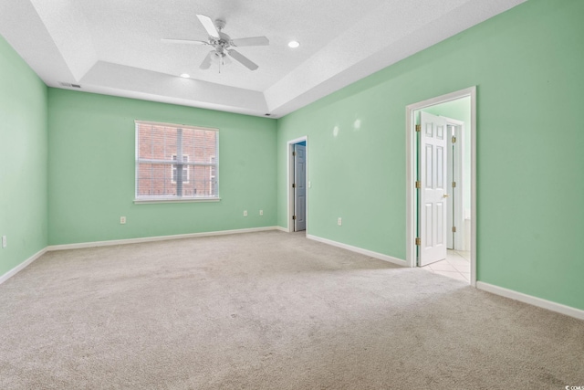 2384 Covington Dr, Myrtle Beach, SC 29579 - carpeted spare room featuring a raised ceiling, ceiling fan, a textured ceiling, baseboards, and recessed lighting