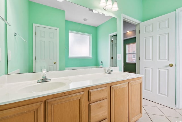 2384 Covington Dr, Myrtle Beach, SC 29579 - bathroom featuring healthy amount of natural light, double vanity, and tile patterned flooring