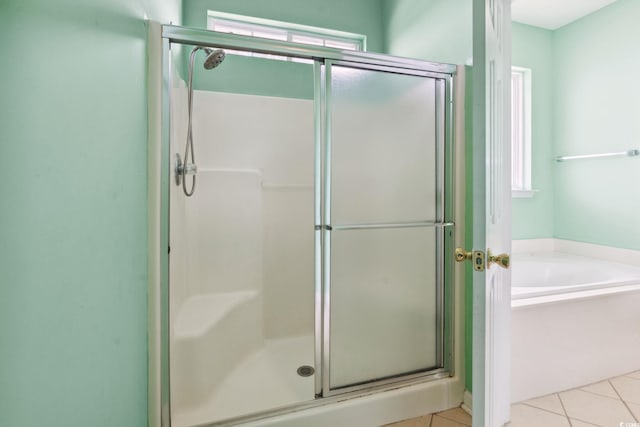 2384 Covington Dr, Myrtle Beach, SC 29579 - bathroom featuring a shower stall, a bath, and tile patterned flooring