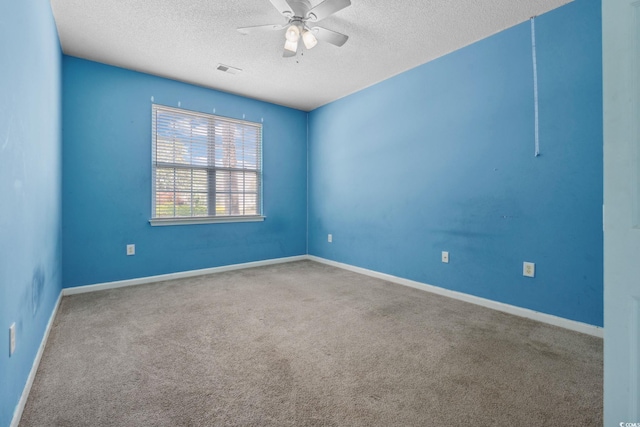 2384 Covington Dr, Myrtle Beach, SC 29579 - carpeted empty room featuring a textured ceiling, ceiling fan, and baseboards