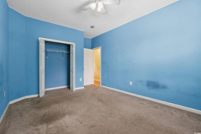 2384 Covington Dr, Myrtle Beach, SC 29579 - unfurnished bedroom featuring carpet floors, baseboards, a closet, and a ceiling fan